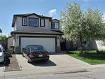 Property Photo: 119 WOODSIDE CRES NW in AIRDRIE